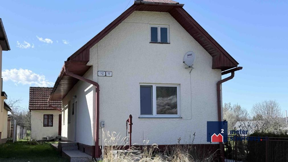 Stavebný pozemok so starším RD Trnové